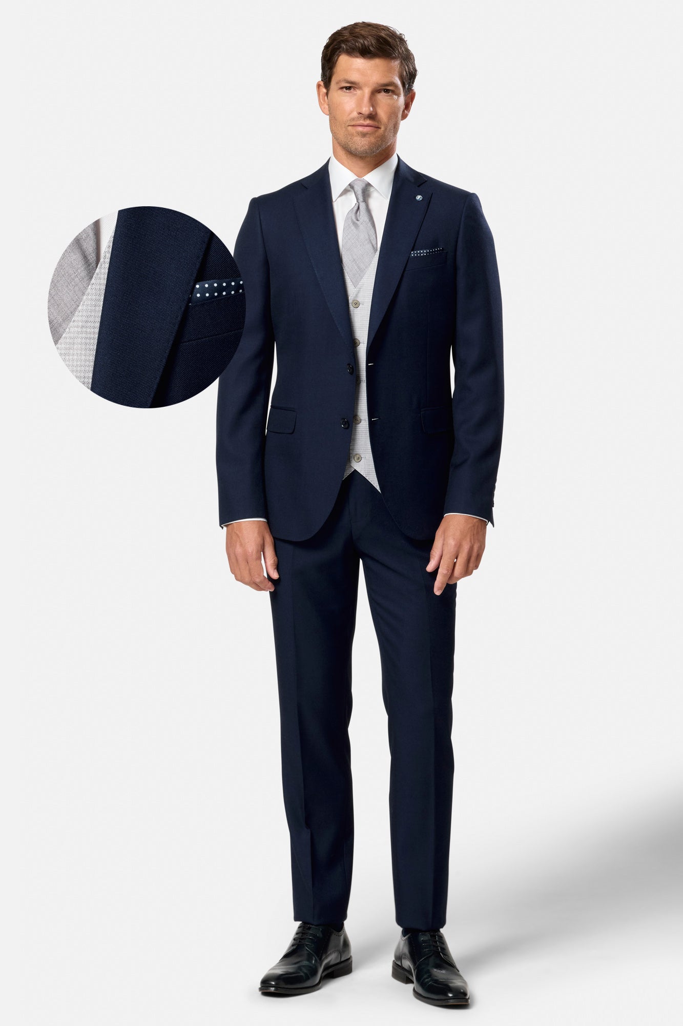 Model wearing a Benetti Menswear Suit 